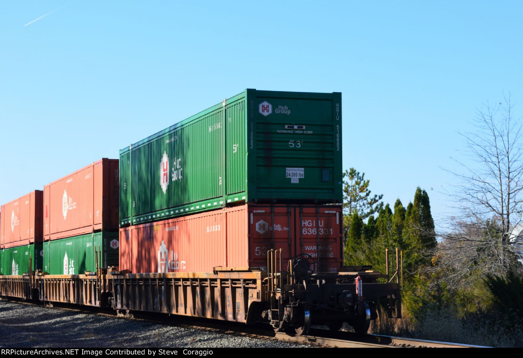 Tail End shot of DTTX 878872B with Hub Group Containers 